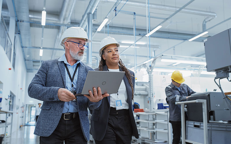 Two people working in a warehouse